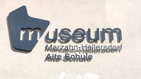Sign displaying the name at the Marzahn-Hellersdorf District Museum, Building 1, at Alt-Marzahn 51 in Berlin-Marzahn, Germany