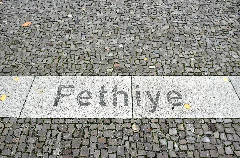 Names of the twinned towns of the Mitte district as a floor design on Rathausplatz Wedding in Berlin, Germany.