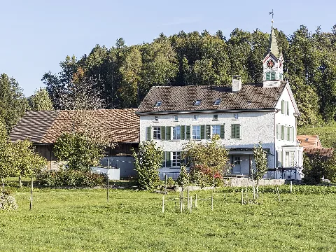 Bertschikon (Wiesendangen): Former schoolhouse, presumably built in 1854 and extended by a tower with clock and bell in 1902