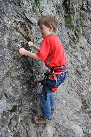 Boy With Climbing Harness