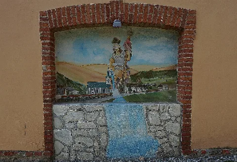 Malerei hl. Florian am ehem. Spritzenhaus der Feuerwache in der Gemeinde Reichenau (Kärnten), Bezirk Feldkirchen in Kärnten, Österreich, Europäische Union mit den Initialen Keiku 04_2002
