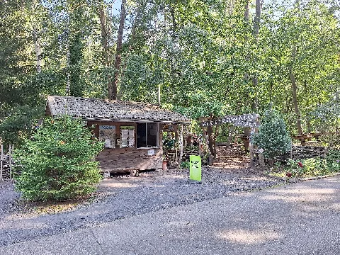 Entrance area of Kletterwald Koala near Neuensorga at the Lederhose interchange of the A 9 motorway in the Saale-Holzland district, Thuringia, Germany. The adventure park features 15 high ropes courses ranging from 0.3 to 19 metres in height as well as a 3D archery course, making it one of the largest high ropes courses in Thuringia. The ticket office and the entrance to the facility are visible.