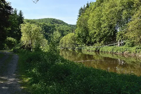 Suspension bridge for pedestrians over Nister river near Helmerother Mühle in Helmeroth municipality, Kreis Altenkirchen (Westerwald), Germany