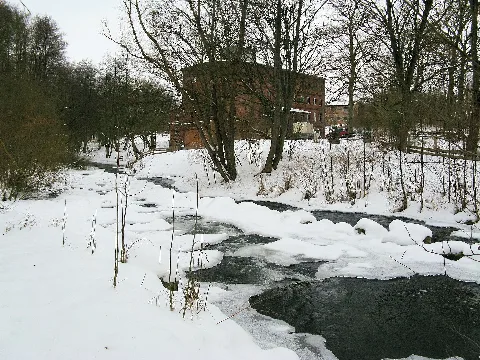 Fish ladder and former watermill at Nebel river in the winter in Kölln, disctrict Güstrow, Mecklenburg-Vorpommern, Germany