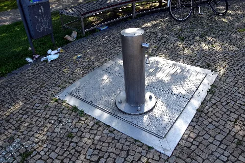 Pump at the paddling pool at Altlandsberger Platz in Berlin-Marzahn, Germany (for 2 of the 3 steles).