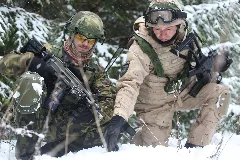 Czech Army Sgt. Van Kmecik And Croatian Army Master Sgt. Bravko Horvat Discuss Patrol Routes