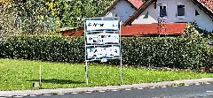 Zweisprachiges Straßenschild Ludmannsdorf Bilčovs